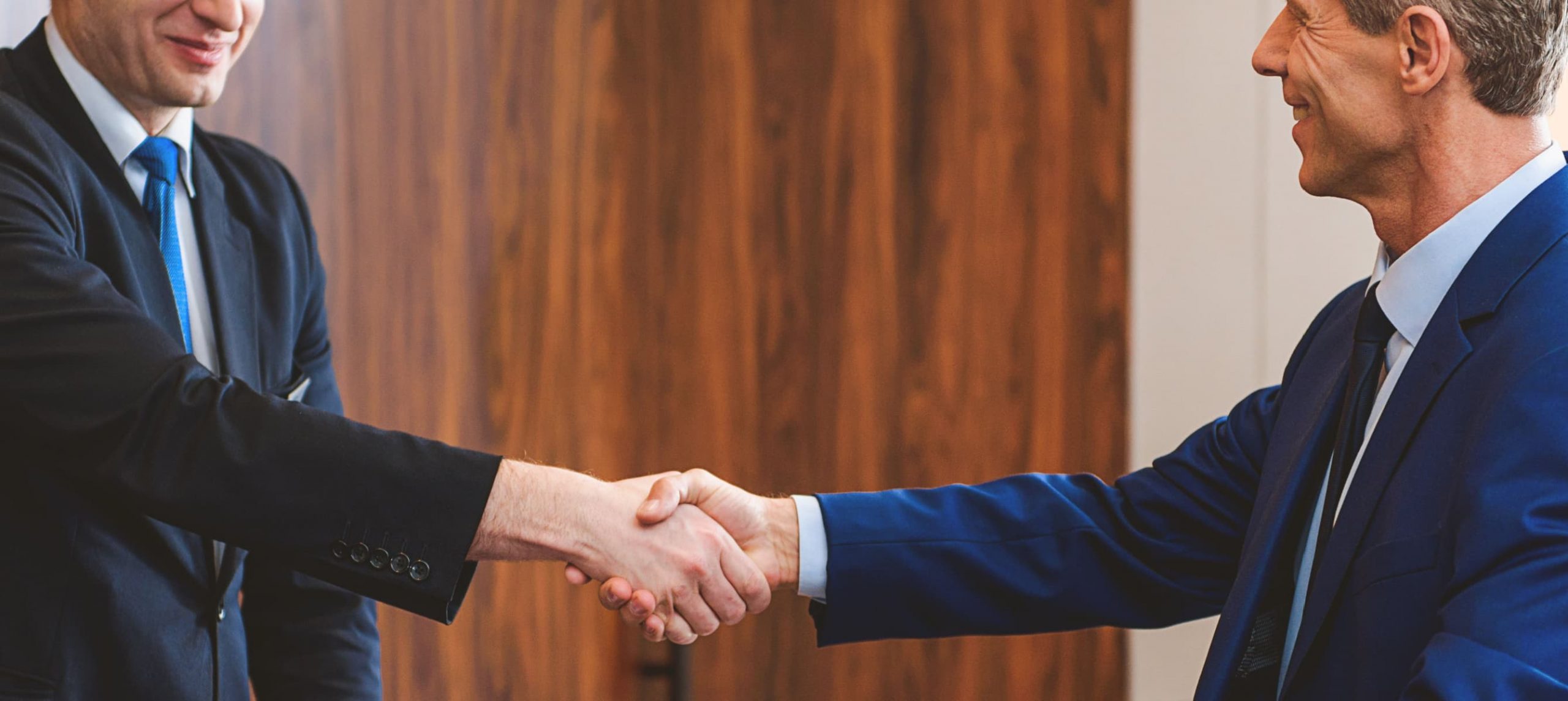 two men shaking hands