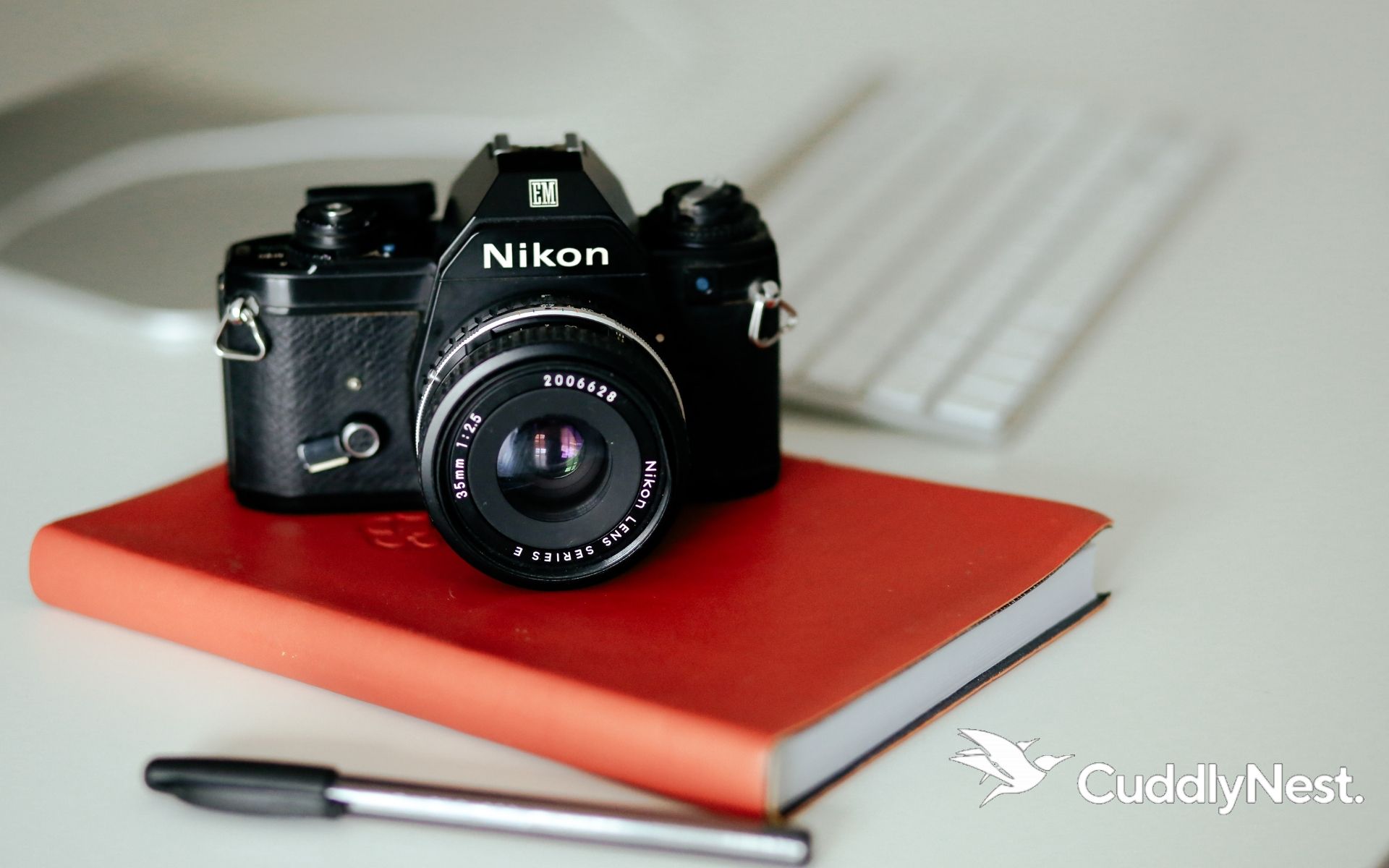 sustainable travel packing list camera CuddlyNest Travel Blog