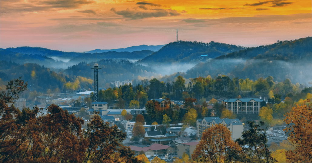 The Space Needle observation tower and the Sky Lift surrounded by the fall foliage in Gatlinburg, Tennessee.