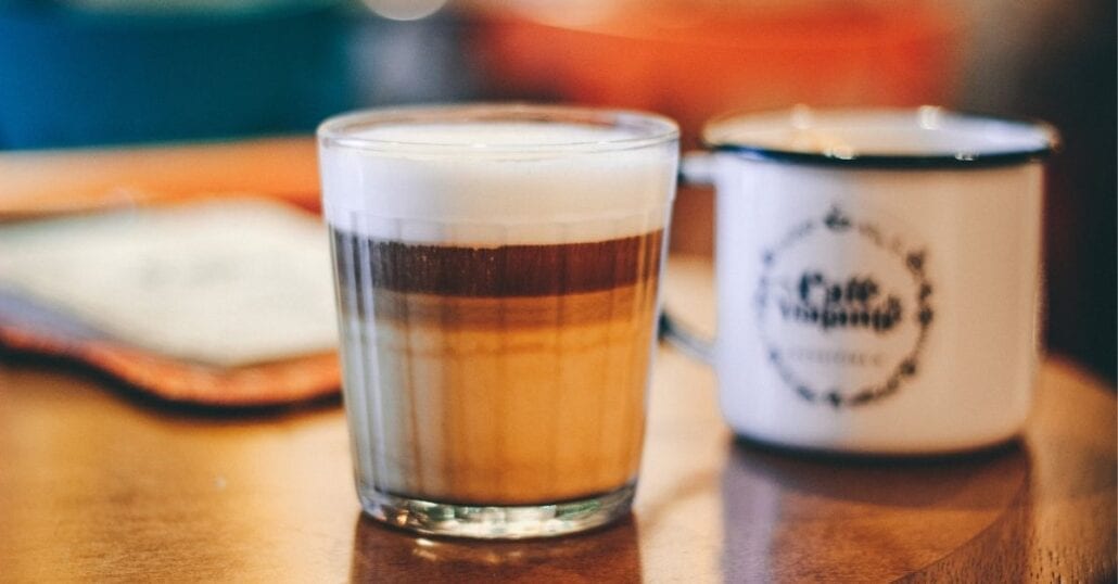 A shot coup filled with coffee and a rich, thick foam on top.