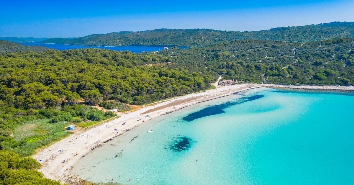 Aerial view of the blue transparent water of the Sakarun Beach, in Croatia.