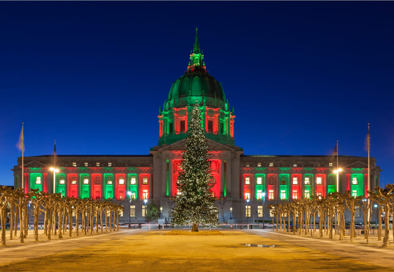 San Francisco City Hall in red and green light during Christmas.
