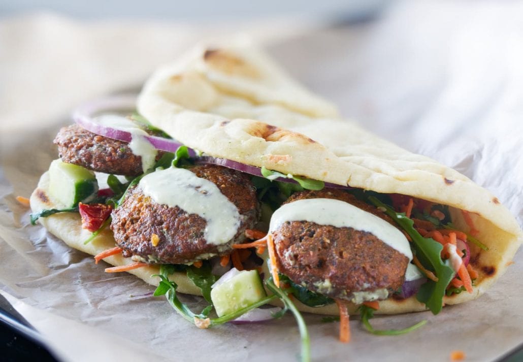 Tasty vegan falafel wrap shot with selective focus