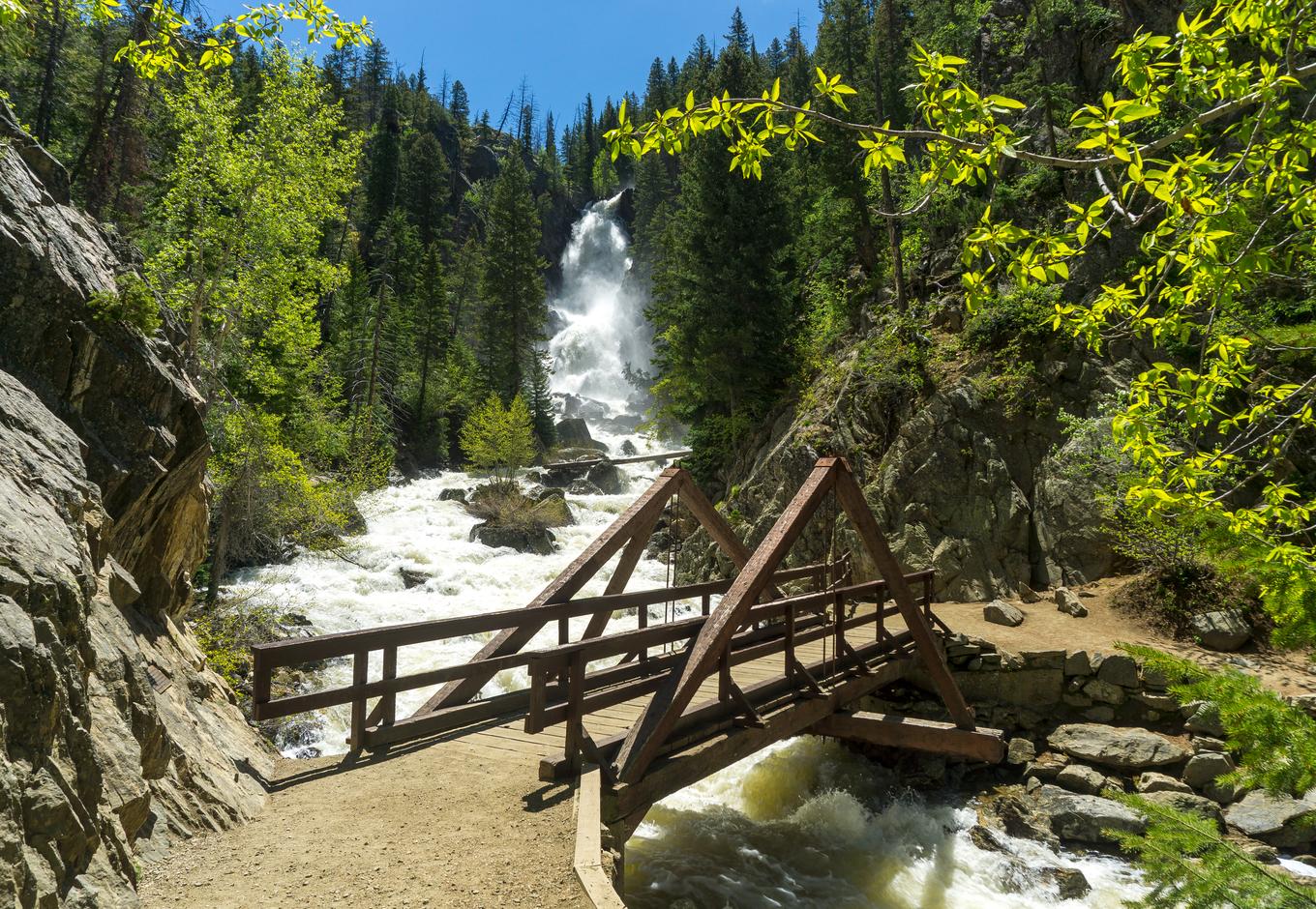 A small bridge over the river at Fish Creek Falls, Colorado.
