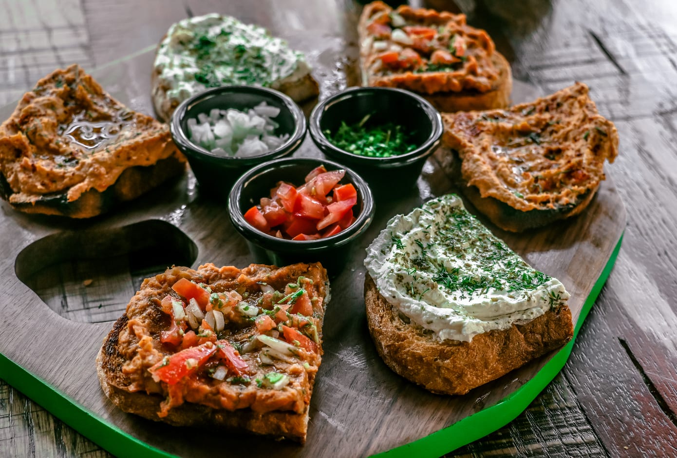 Variety of Middle Eastern  sandwiches with spreads.