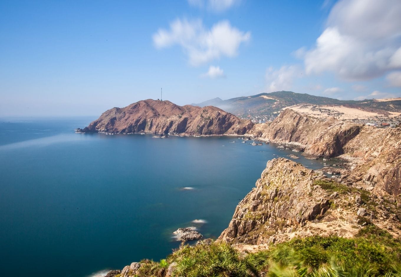 The blue ocean framed by cliffs in Nha Trang to Quy Nhon, Vietnam.