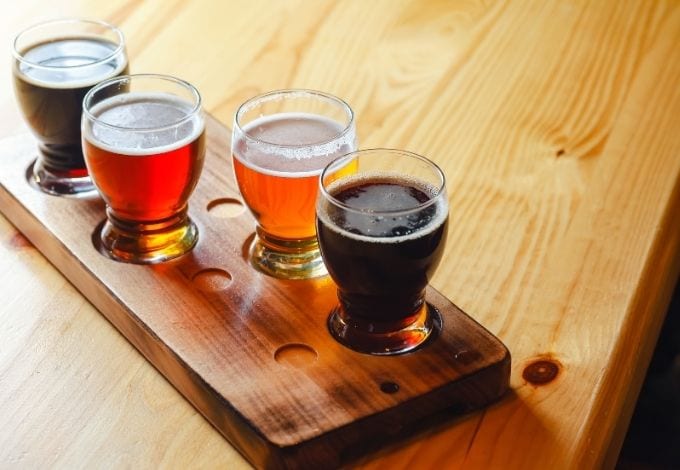 A set of four craft beers.