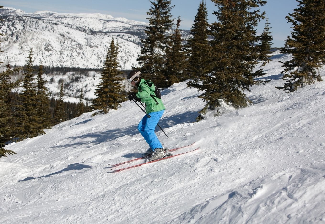 Person downhill skiing at the Steamboat Resort, Colorado.