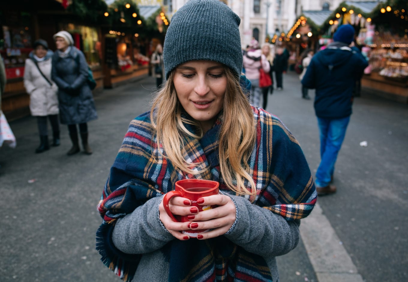 Girl sipping on holiday drinks in New York City, New York