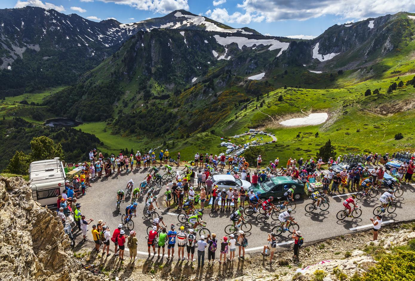 The peloton climbing the road to Col de Pailheres in Pyrenees Mountains during the stage 8 of Tour de France, 2013.
