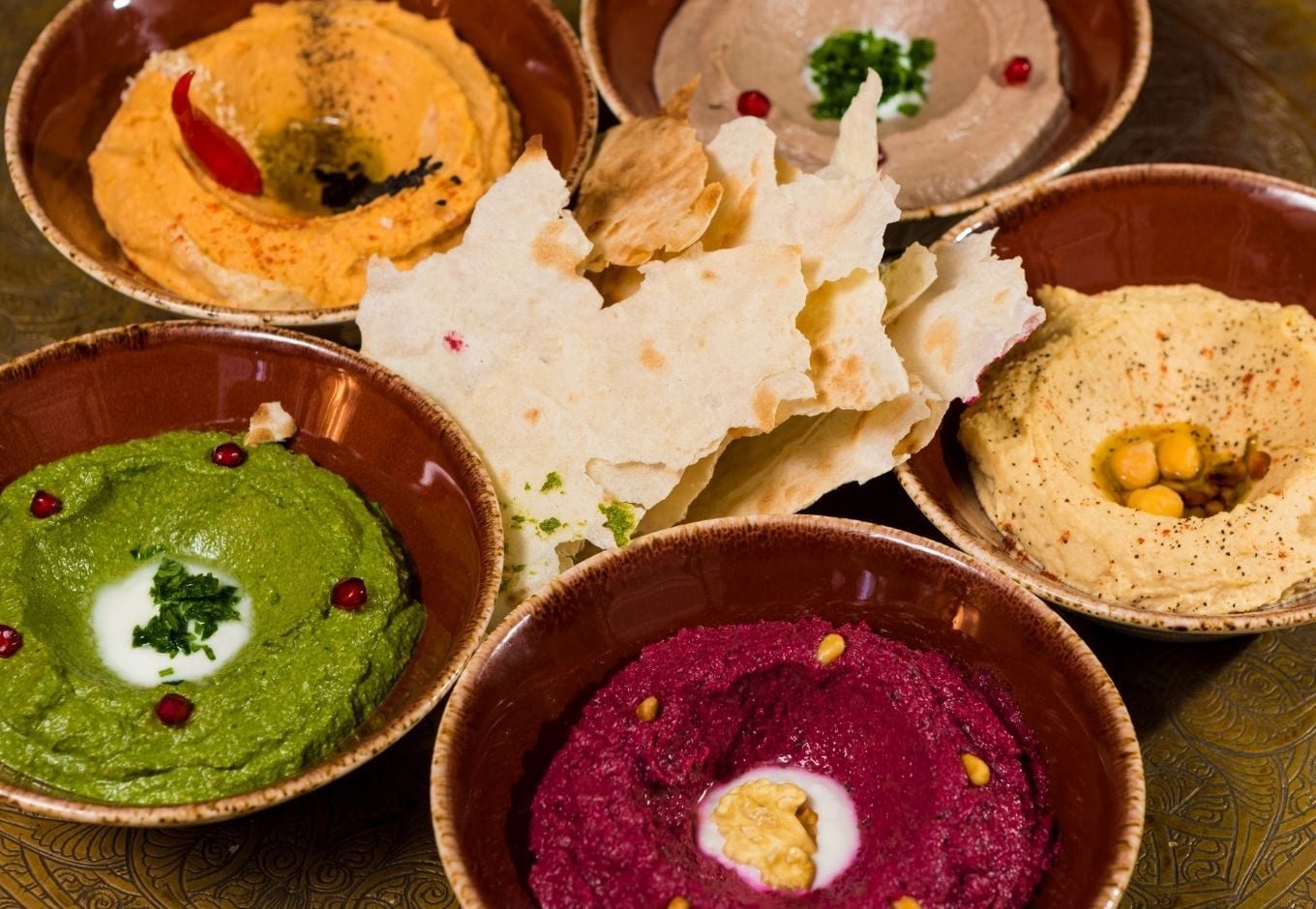 Small bowls of mezze appetizers.