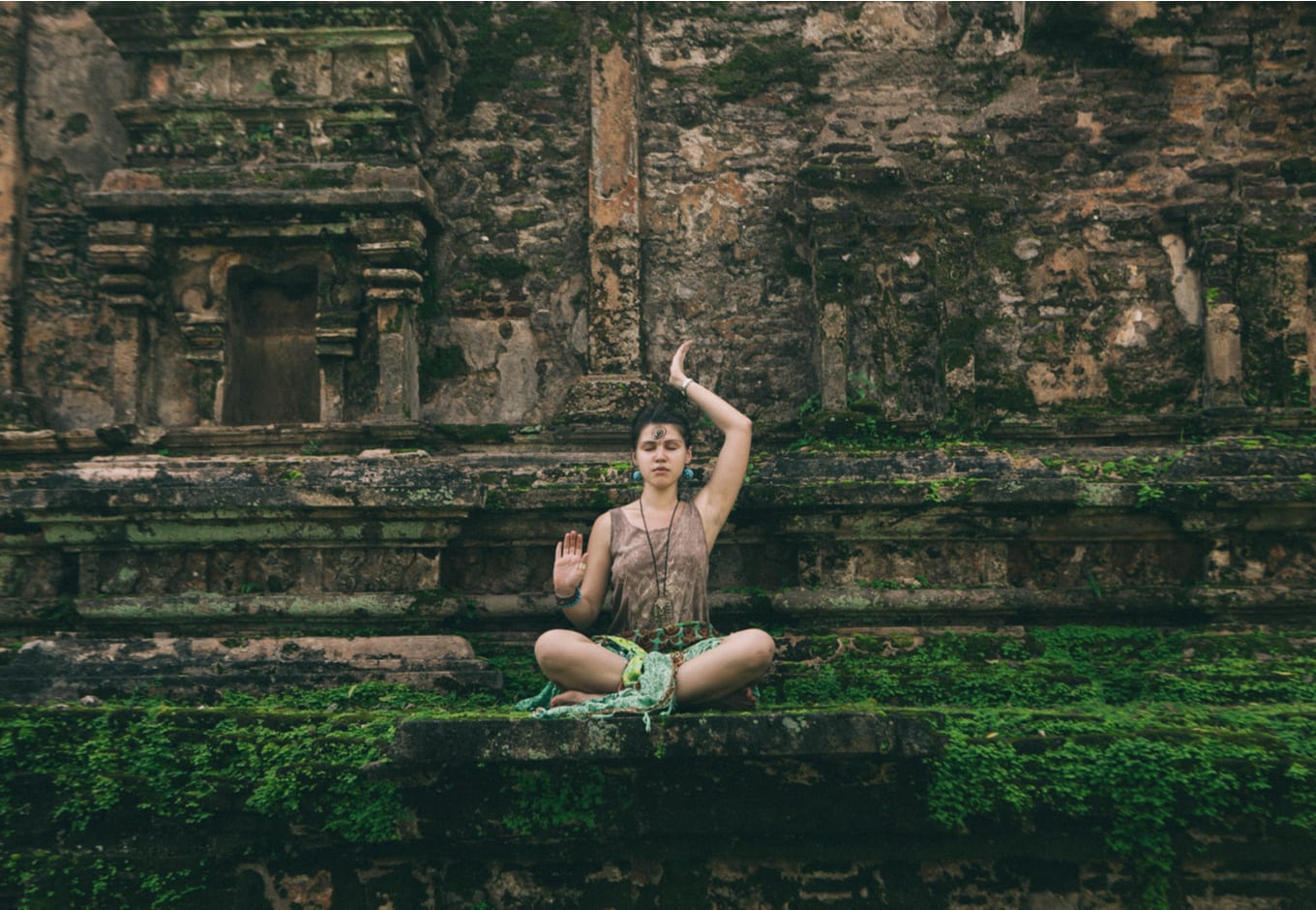 Yoman doing a yoga pose in Sri Lanka.