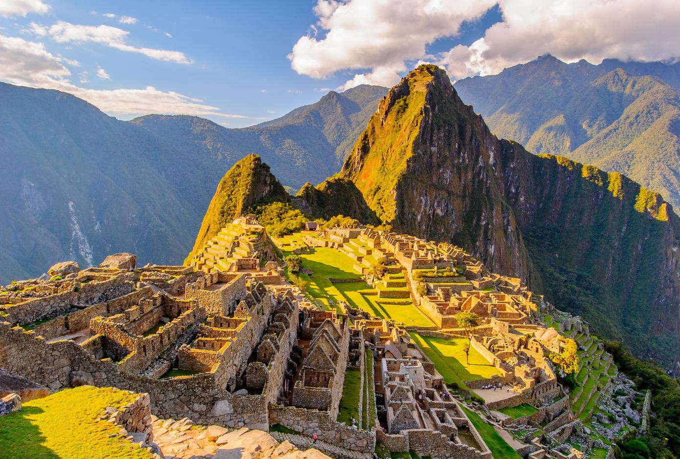 View of Machu Picchu during a sunny day, in Peru.