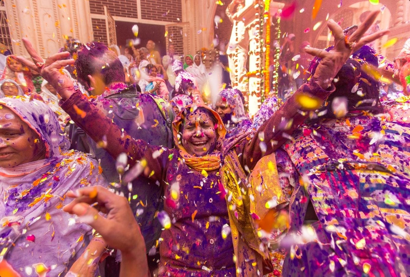 holi with flowers flower holi phoolon holi happy woman in petals