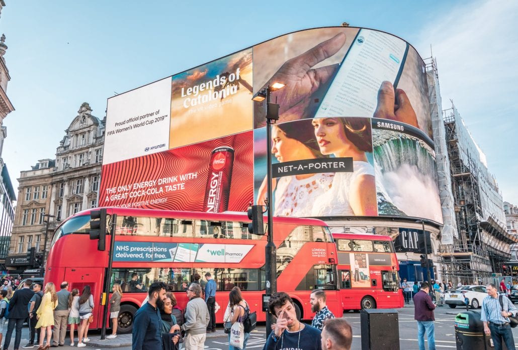  People and Traffic in Picadilly Circus, London.