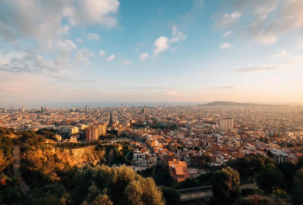 Sunset cityscape skyline view from Bunkers Del Carmel, in Barcelona, Spain