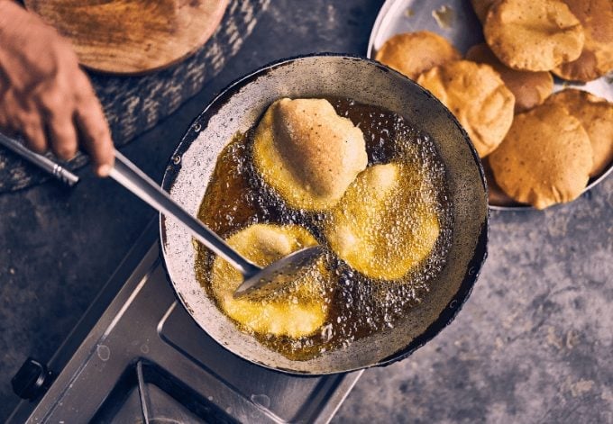 Cooking Pooris In Bhalsona, Uttar Pradesh, India