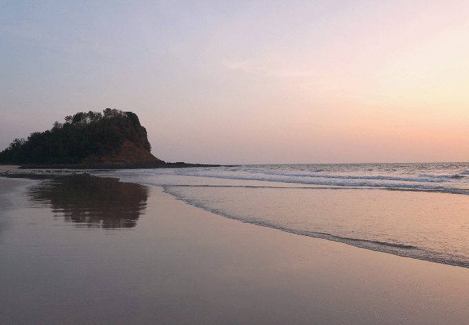 Kashid beach located 30 km from Alibaug famous for its beautiful clear blue water, white color sand and lovely streams, Maharashtra, India.