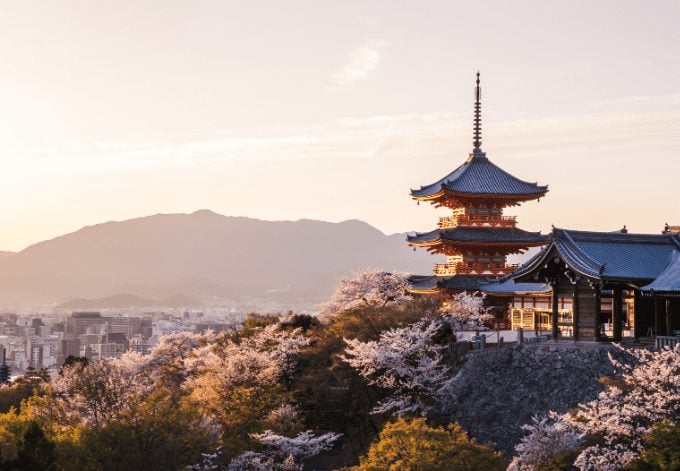 Sunset at Kiyomizu-dera Temple during the cherry blossom (Sakura) season in spring in Kyoto, Japan.