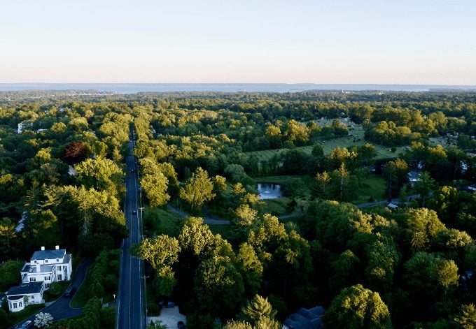 The leafy North Street in Greenwich, Connecticut, looking towards the Long Island Sound