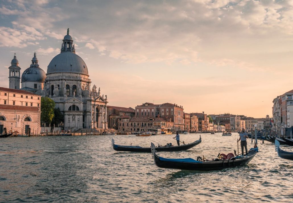 The Grand Canal, in Venice, Italy, at dusk.