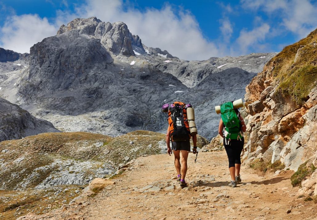 High mountains trekking two people Picos de Europa Cantabria Spain