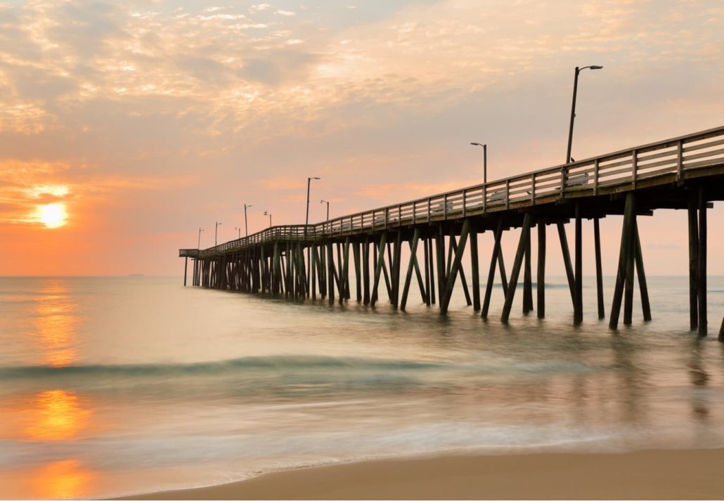 Fishing Pier at Sunrise at Virginia Beach, Virginia, USA.