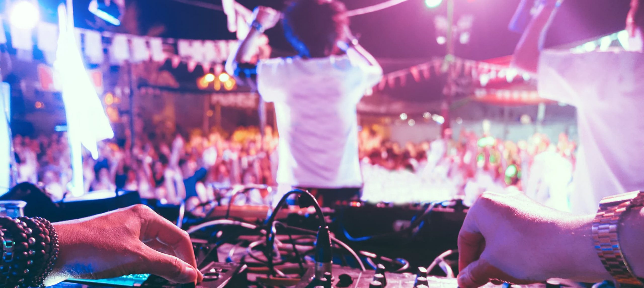 DJ mixing set at a party.