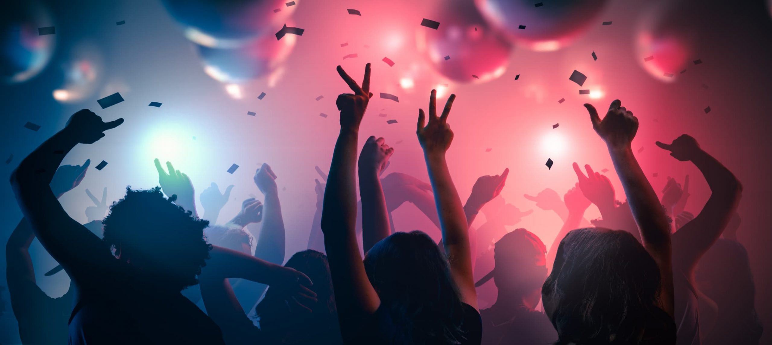 A young crowd dancing at a nightclub