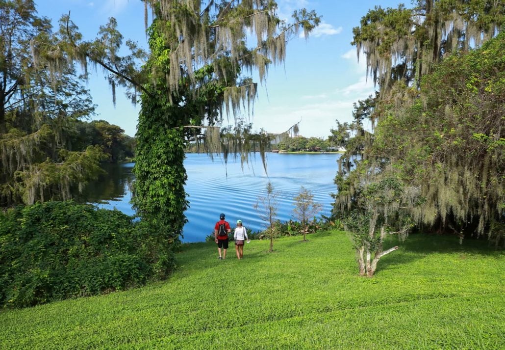 Couple overlooking Lake Rowena, at the Harry P. Leu Gardens