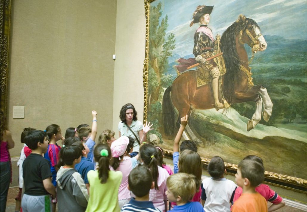 A group of kids during a guided excursion in Prado Museum, Madrid, Spain.