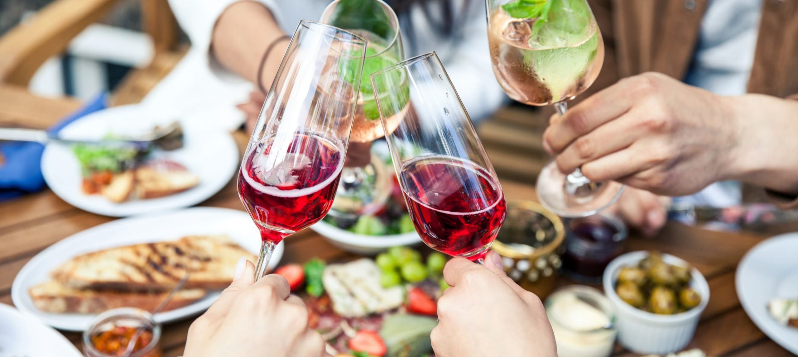 Group of friends toasting in a restaurant