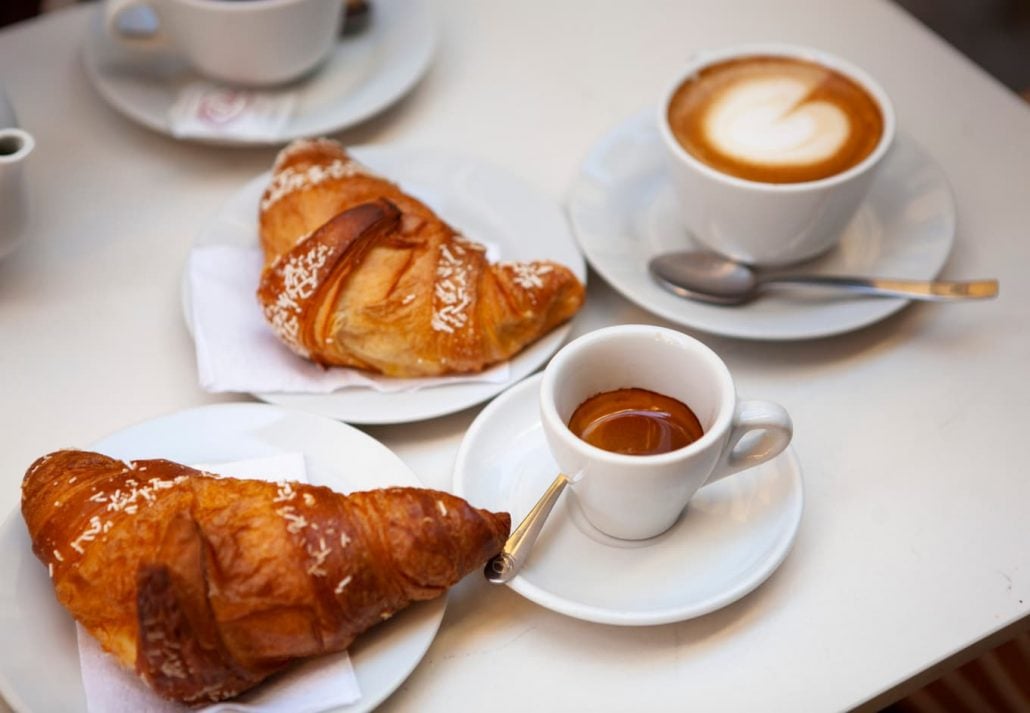 Italian-style breakfast: Cornetto (Italian croissant), coffee and cappuccino.
