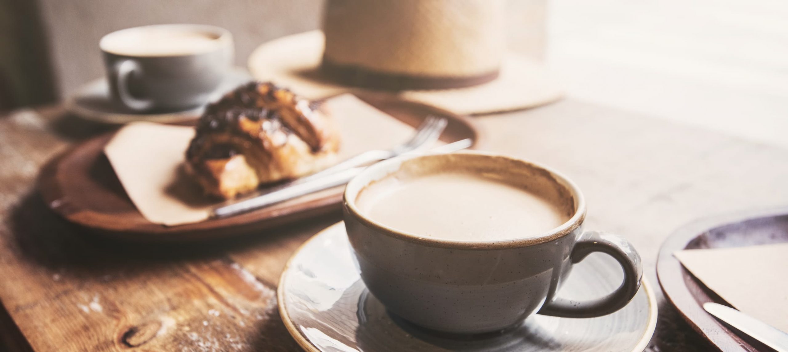 Typical Italian breakfast: cappuccino and brioche.