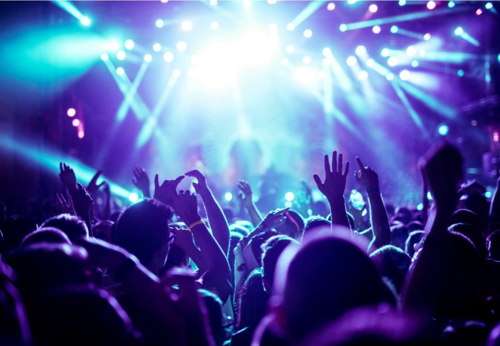 Young crowd partying at a nighclub.