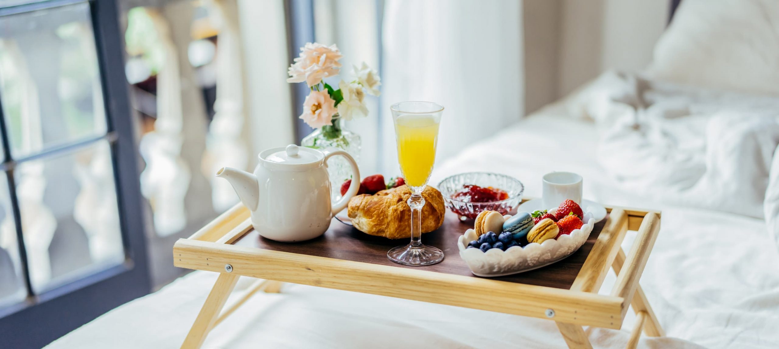 Breakfast in bed at a hotel.