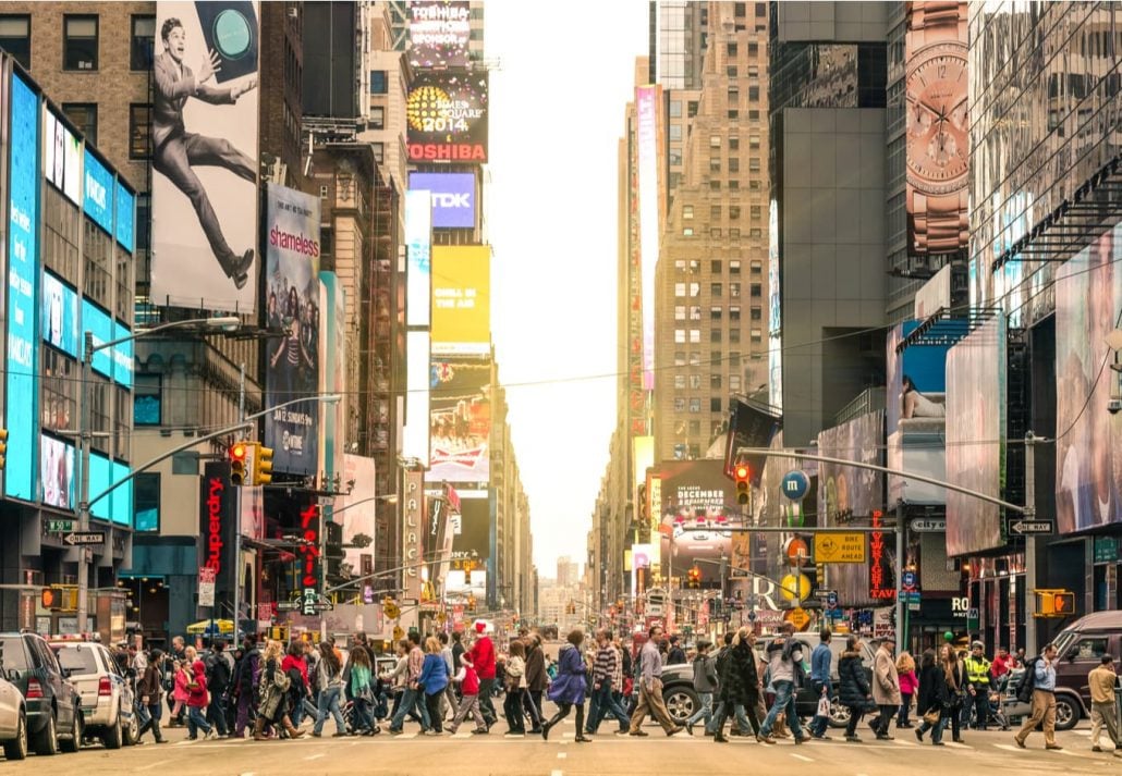 People walking around Times Square NYC