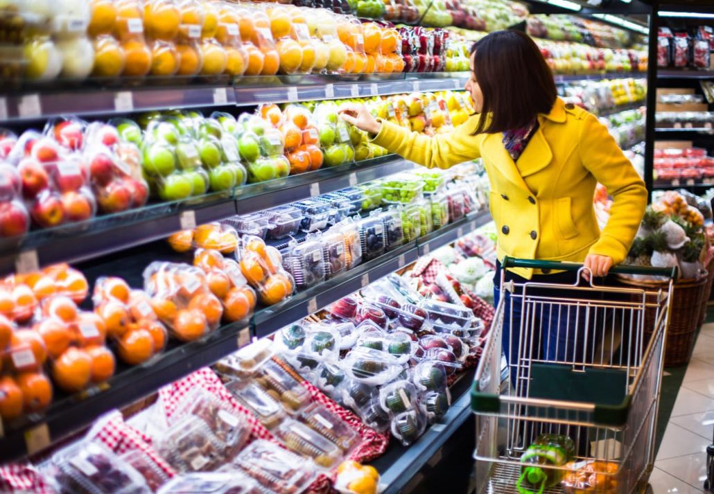 A woman shopping at a grocery store