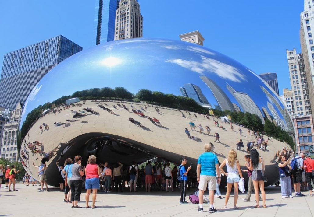 People in front of The Bean, in Chicago, Illinois.