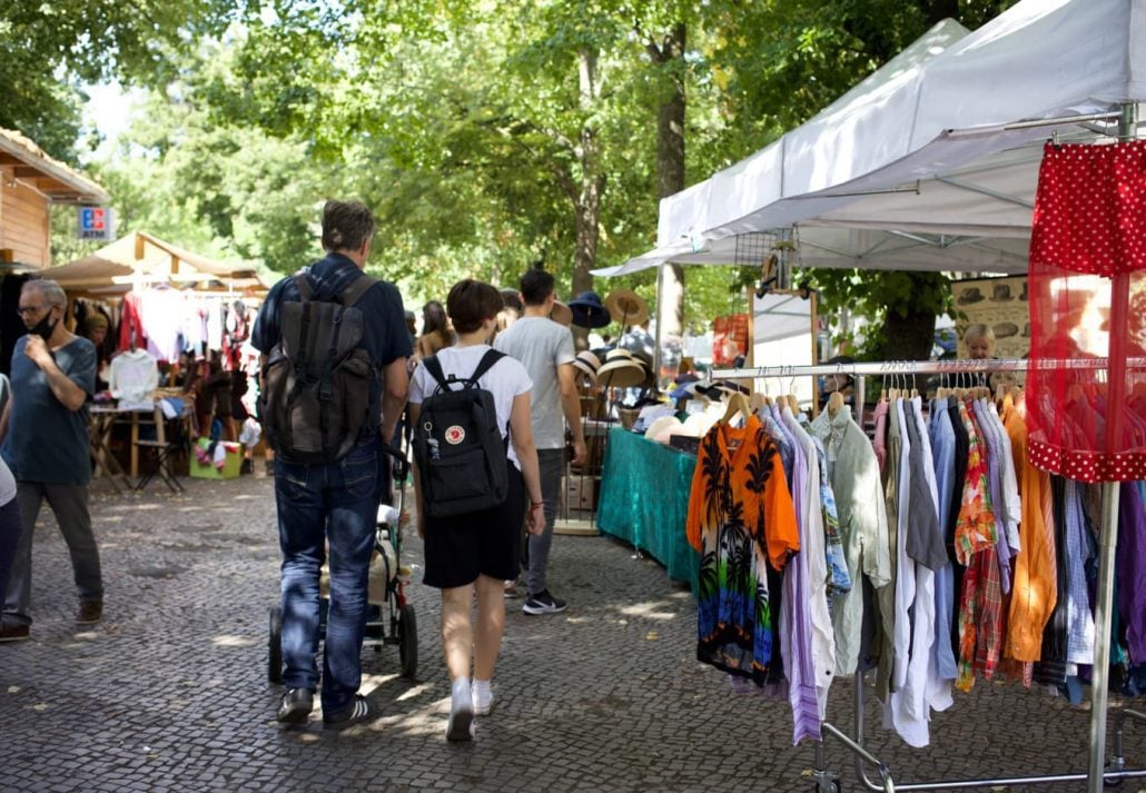 People walking on the cobblestone street in Boxhagener Platz