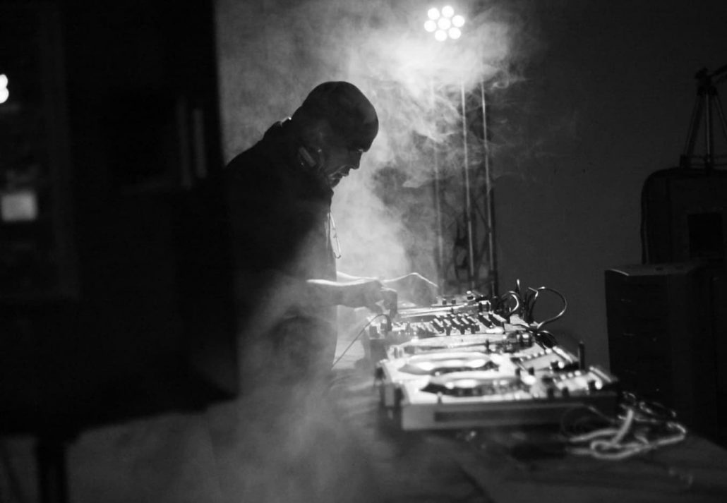 A DJ playing in darkness at Tresor club