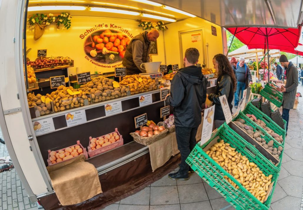 Two people buying food from the food stall in Turkish Market