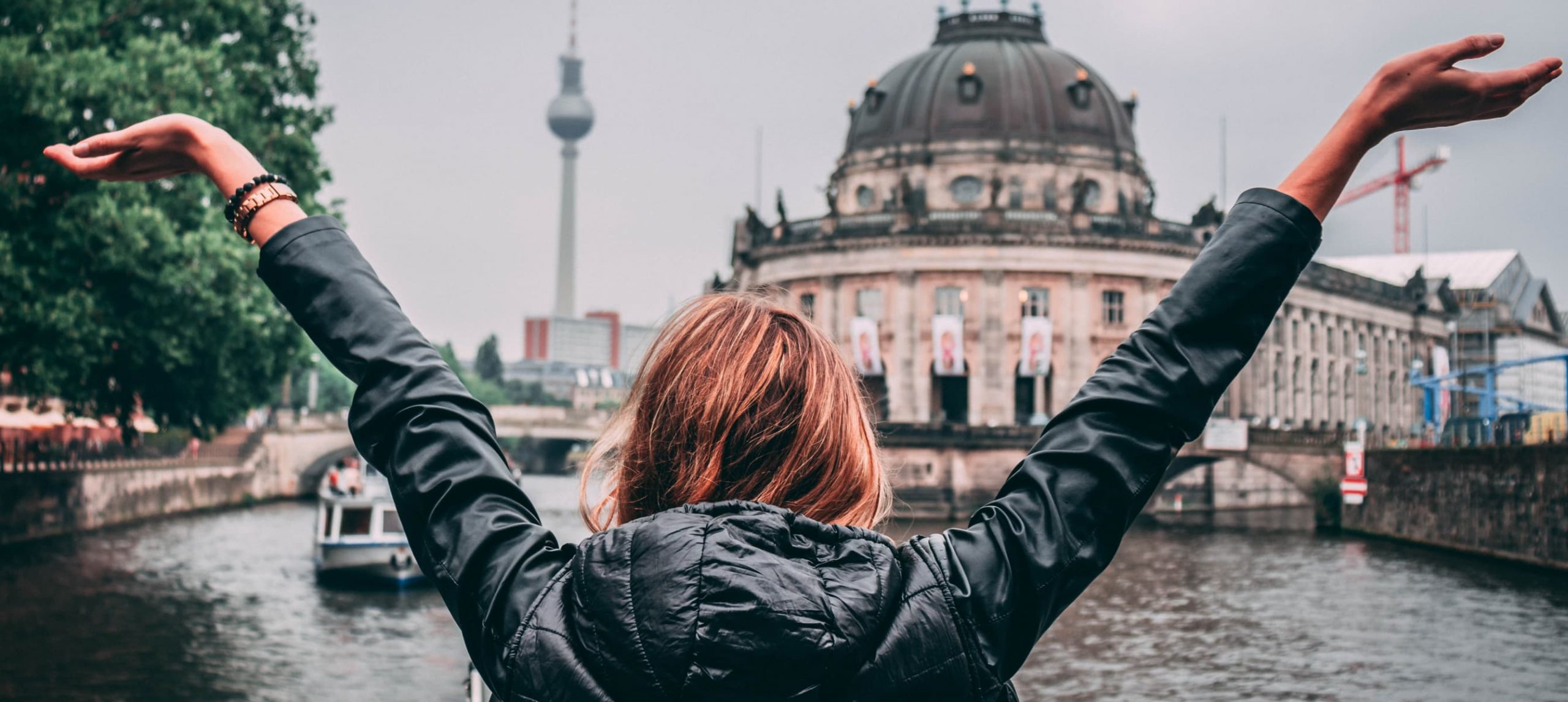 Young woman overlooking the Museum Island in Berlin, Germany.