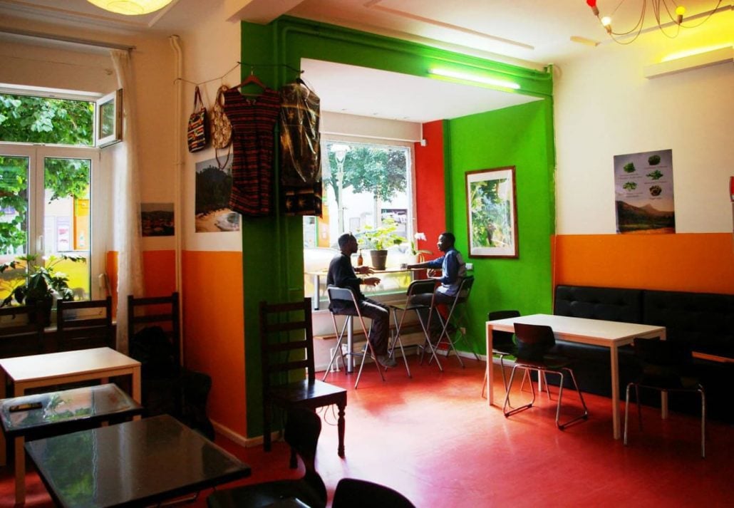 Salone Market restaurant with two males chatting at the table