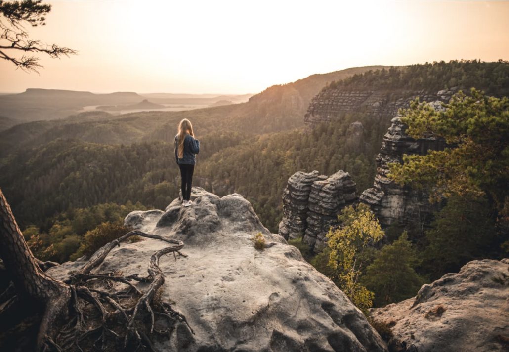 Young hiker woman in the Bohemian Switzerland National Park, Czech Republic.