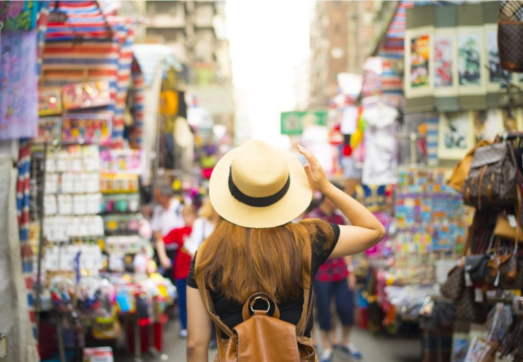 Young woman tourist exploring Mongkok, in Hong Kong.