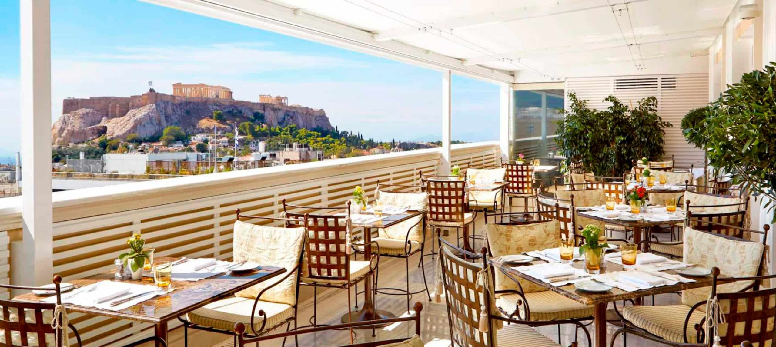 Traditional Greek Outdoor Restaurant With Mediterranean Sea View