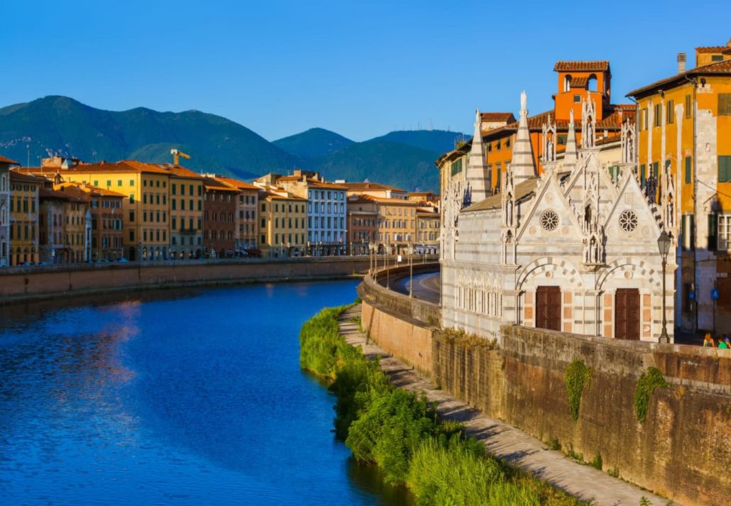River Arno with famous landmarks lined up by it, Pisa