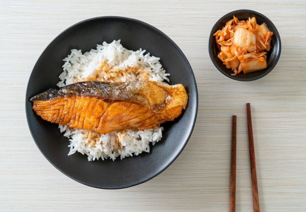 Grilled salmon over rice