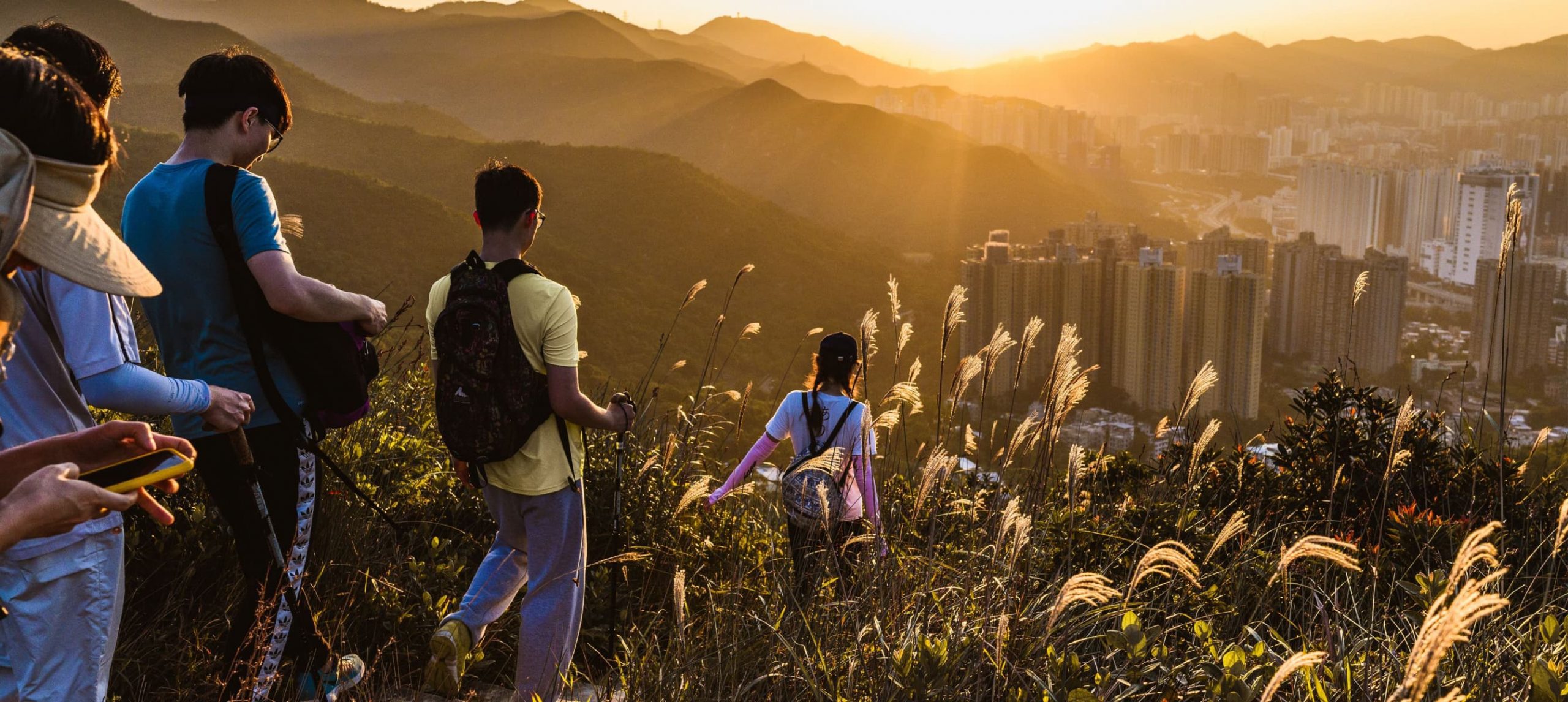 A group of people hiking in Shatin, Hong Kong.